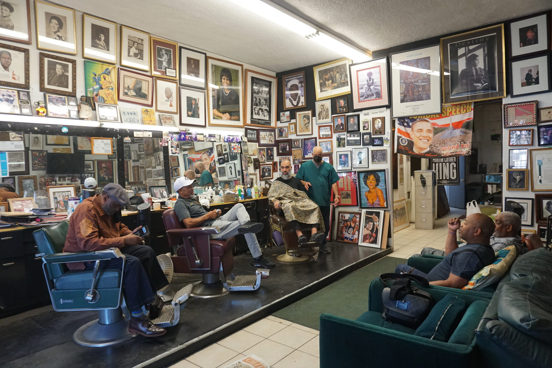 Tolliver’s barbershop in Los Angeles is a place for conversation.