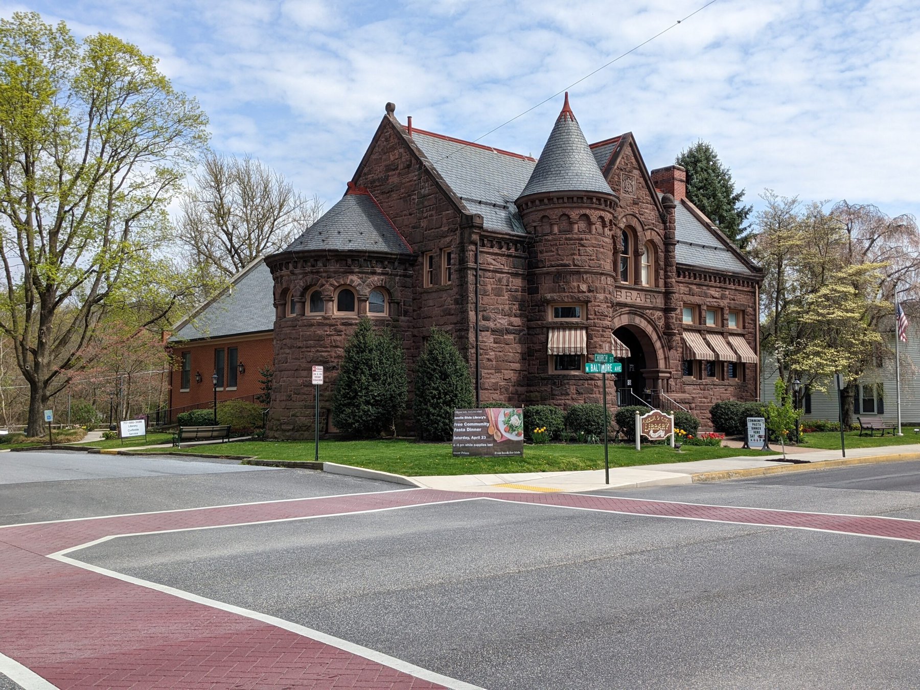 A photo featuring the exterior of the Amelia S. Givin Free Public Library in Mt. Holly Springs, Pennsylvania