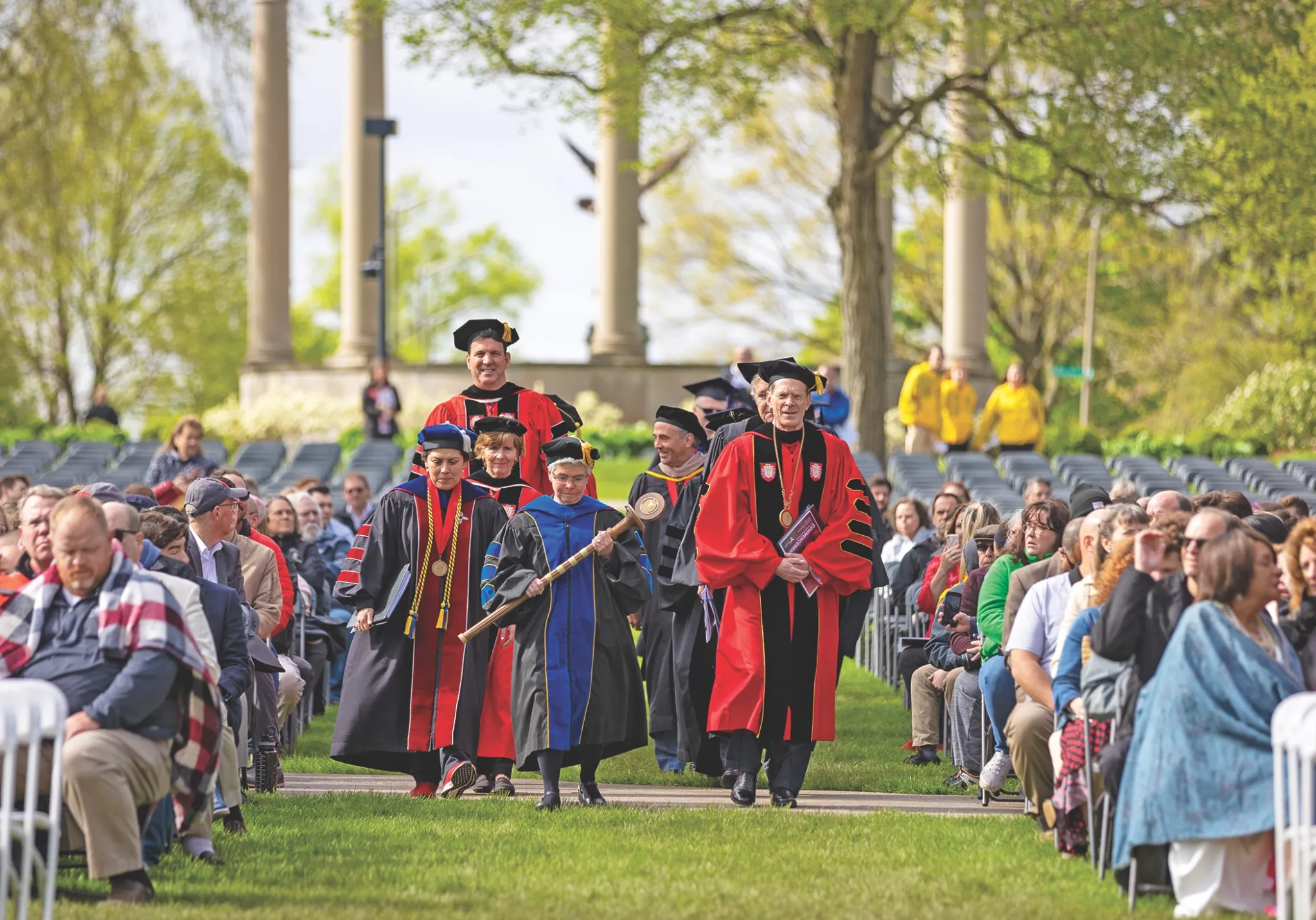 Ball State president Geoffrey Mearns, at front and on the right, leading a commencement procession this past May. Photo Courtesy of Anthony Romano/Ball State University