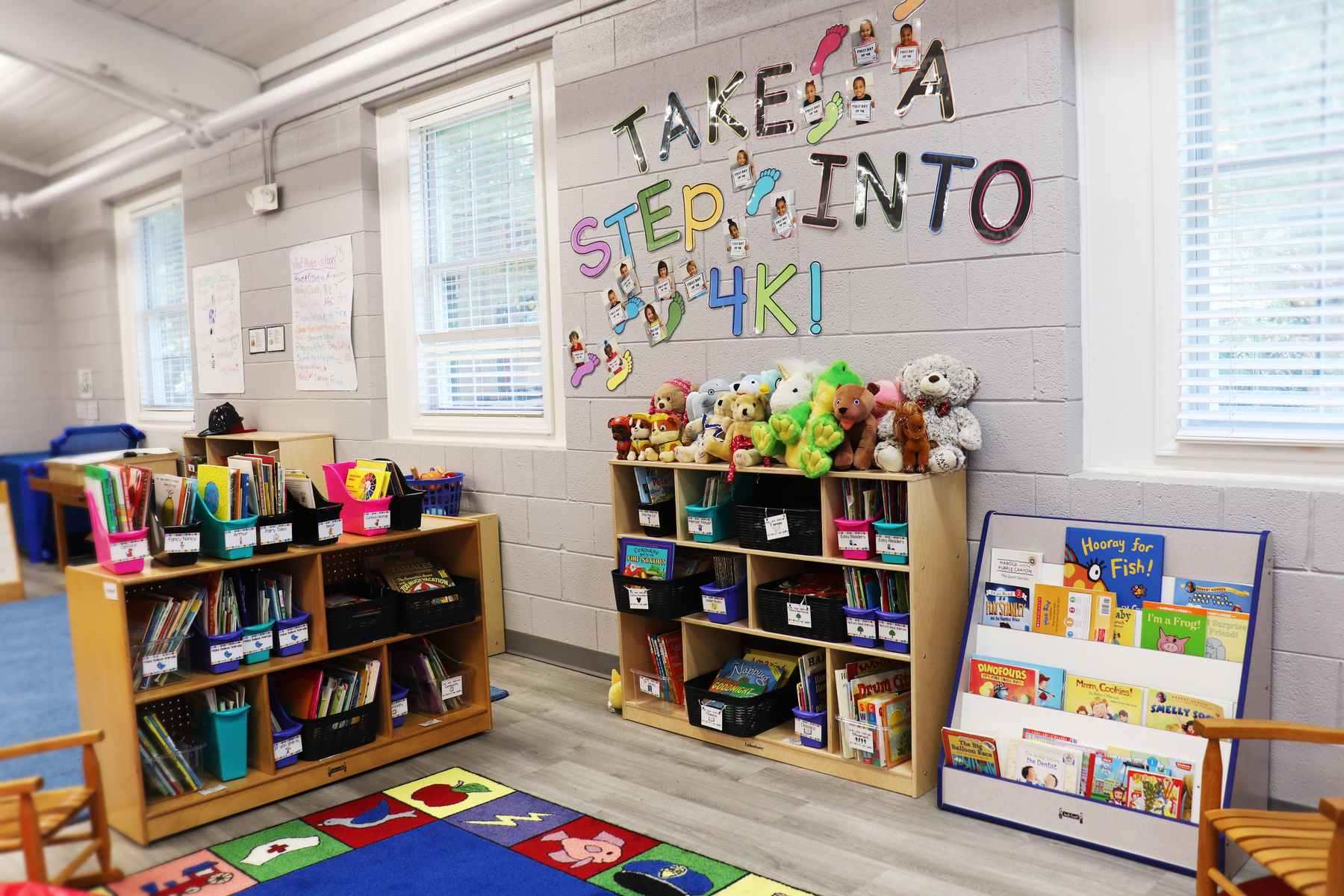 A 4K classroom at the Fort Lawn community center filled with shelves of children's books and stuffed animals. 
