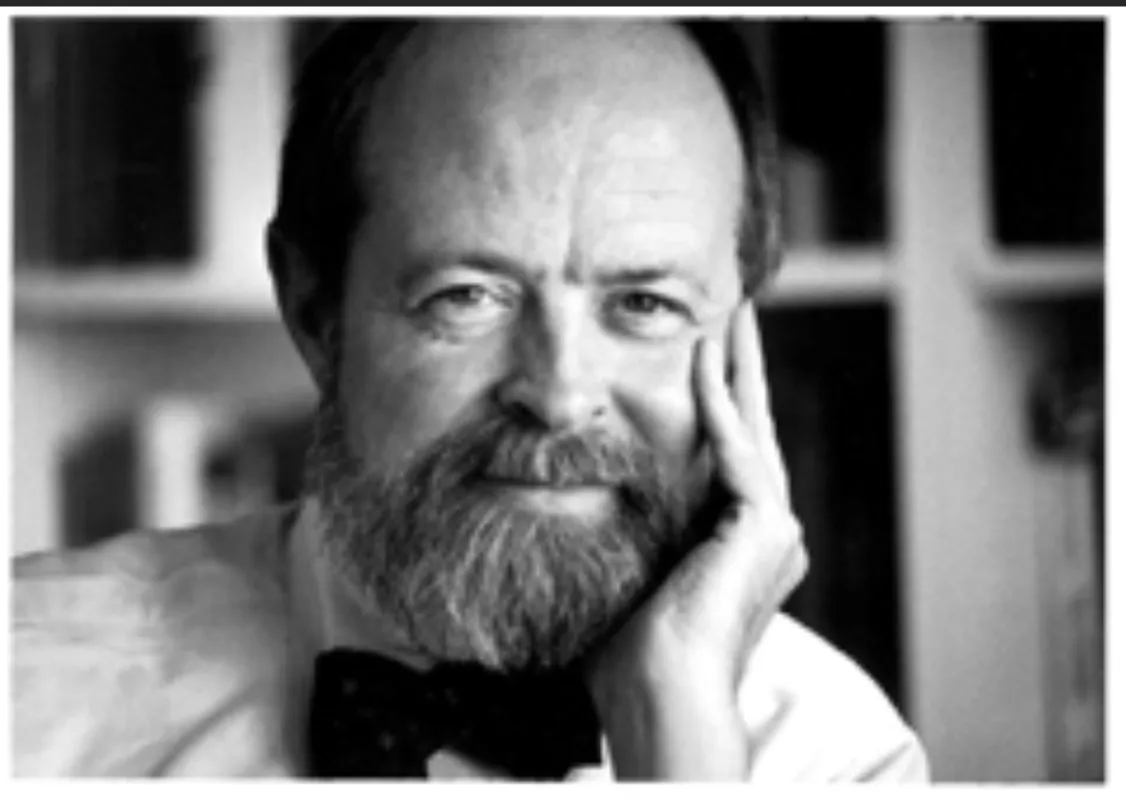 Portrait of bearded man, wearing bow tie.